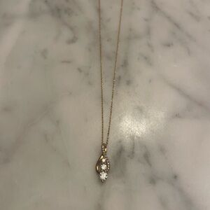 Diamond twisted infinity gold pendant necklace, 10K